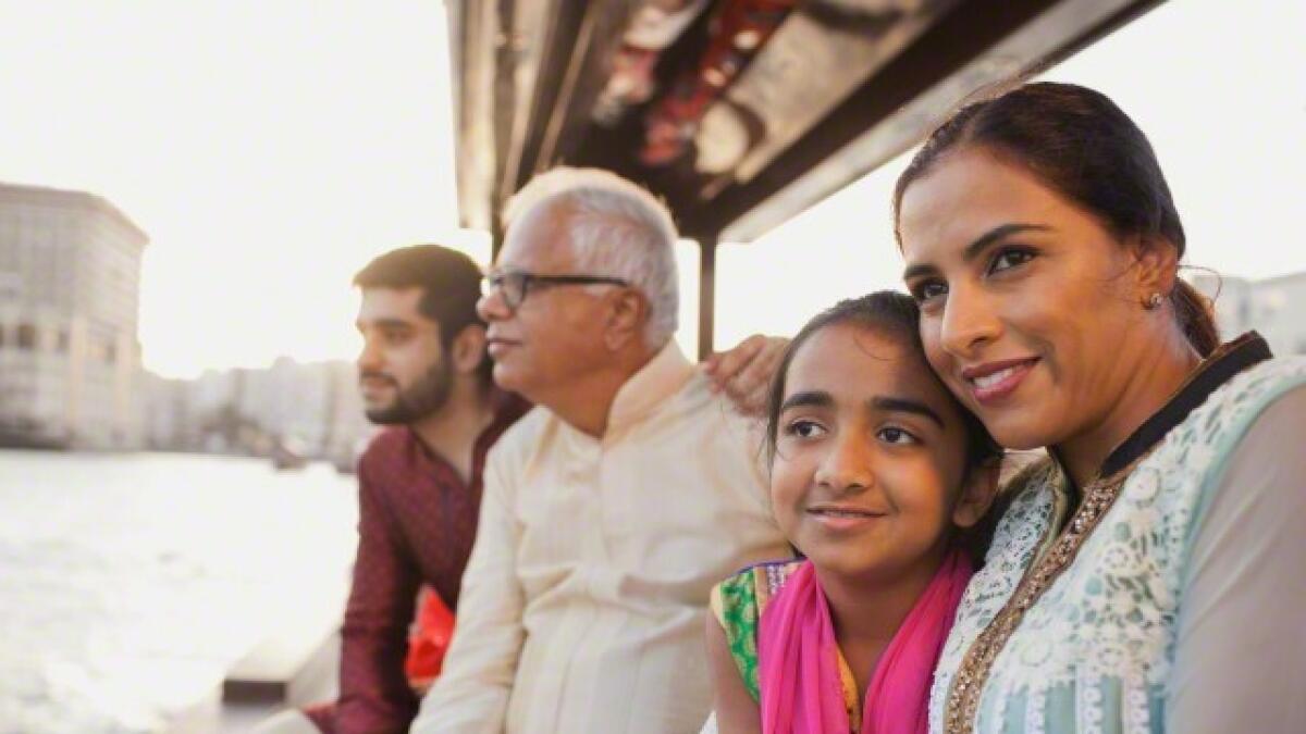Family on a boat ride in Dubai