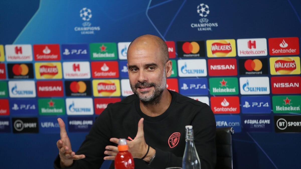 Manchester City manager Pep Guardiola addresses the media.— Reuters