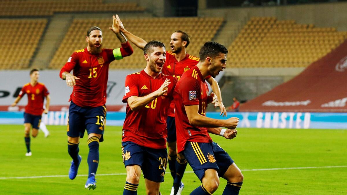 Spain's Ferran Torres celebrates scoring their second goal.