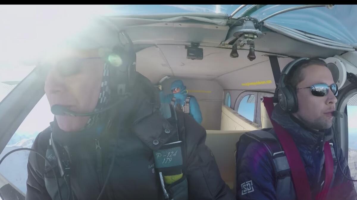  Video: Daredevils jump from mountain top, land in plane mid-air