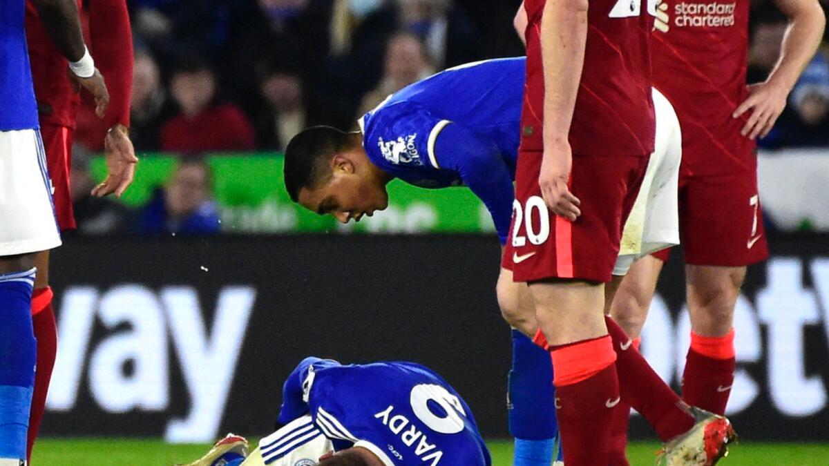 Jamie Vardy lies on the pitch after suffering the injury. — Reuters