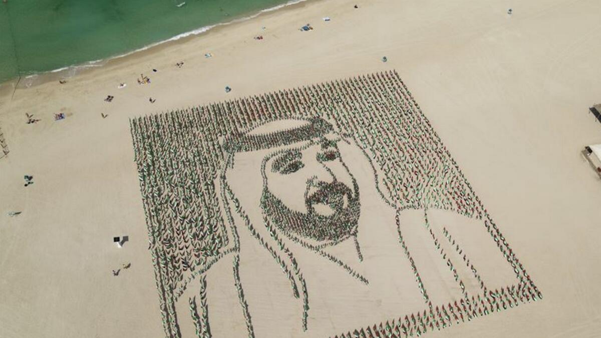 Photos: 4,000 flags paint stunning Sheikh Khalifa portrait in Dubai sands