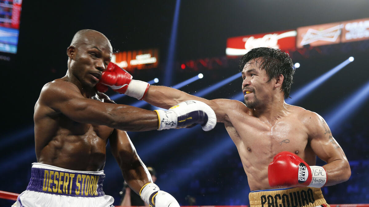 FIGHTING FINALE: Pacquiao wins farewell fight against Bradley