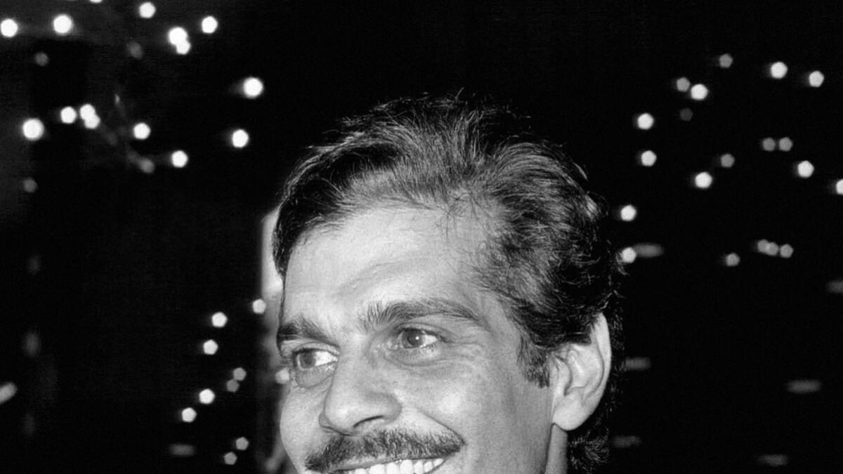 In this1963 file photo, Egyptian actor Omar Sharif on his arrival at London Airport.