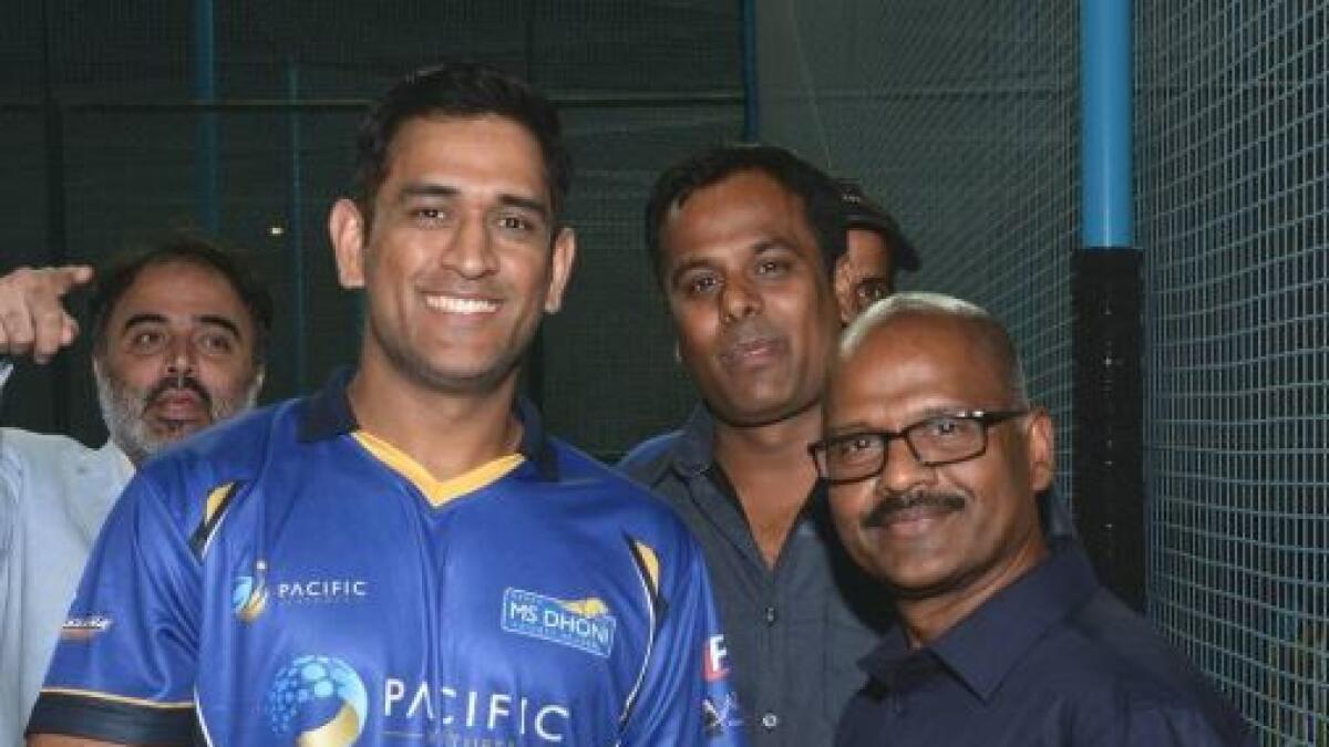 Salim Sanghati (right) with former India captain MS Dhoni, during his visit to the UAE.