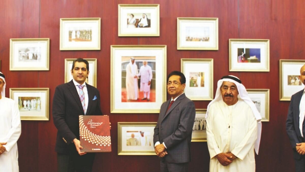 At the launch of 'A Glittering Success Story' - a coffee table book chronicling the journey of the Joyalukkas Group. Dr Aman Puri, Consul-General of India to Dubai and the NorthernEmirates, received the first copy from Joy Alukkas at the Indian Consulate in Dubai on September 22, 2020.
