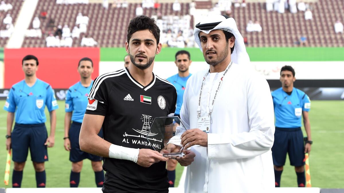 Adel Al Hosani was presented with the ‘Arabian Gulf Cup Final Star’ trophy by Suhail Al Areefi, CEO of the PLC.  