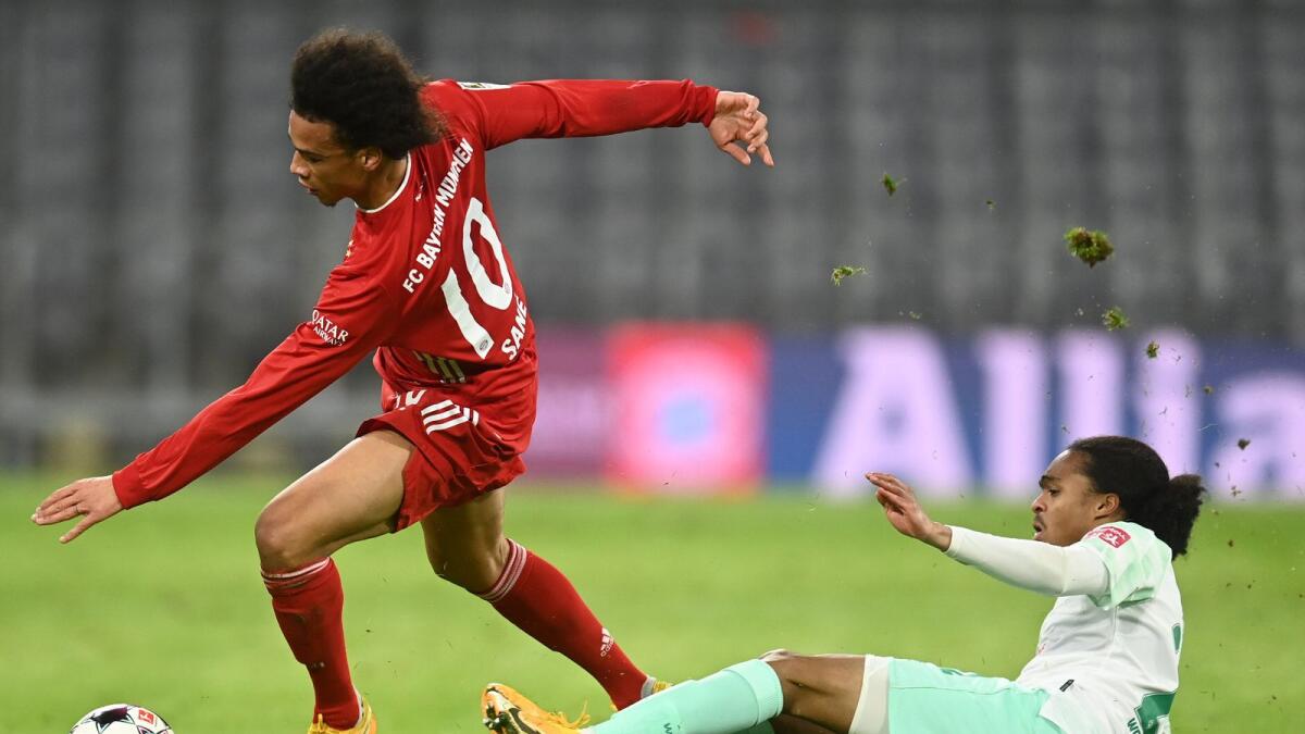 Bayern Munich's Leroy Sane in action against Werder Bremen's Tahith Chong Pool. — Reuters