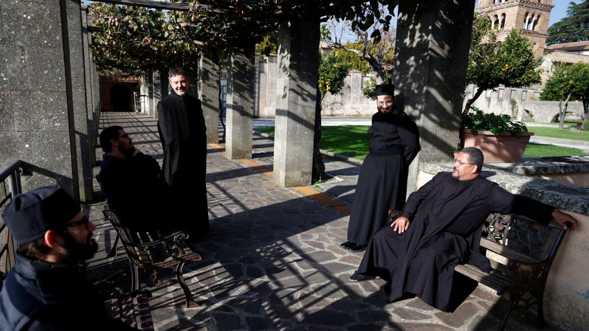 Monks gather after lunch at Greek Abbey of Saint Nilus, which hosts Italy's last ten Basilian monks of the Greek rite, in Grottaferrata, Italy.