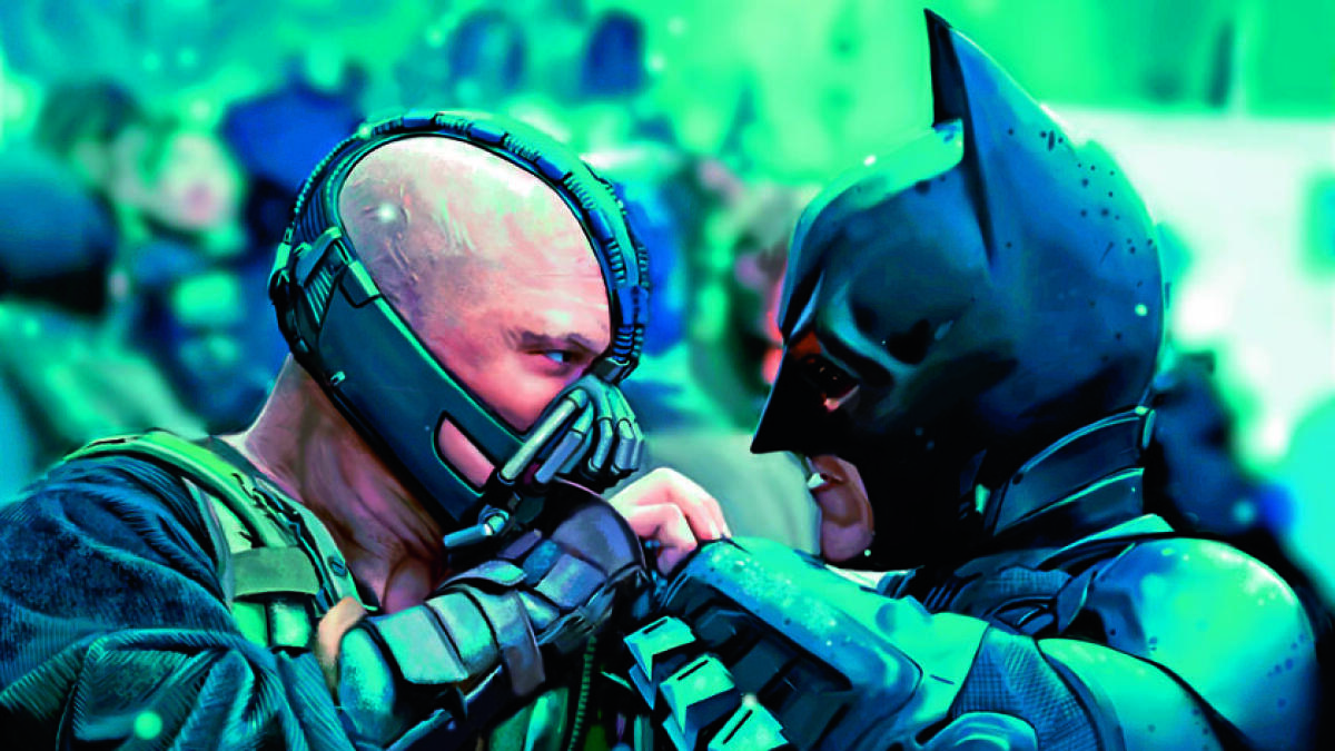 Christian Bale (right) reprises his role as Batman, opposite Tom Hardy, who stars as the villain Bane
