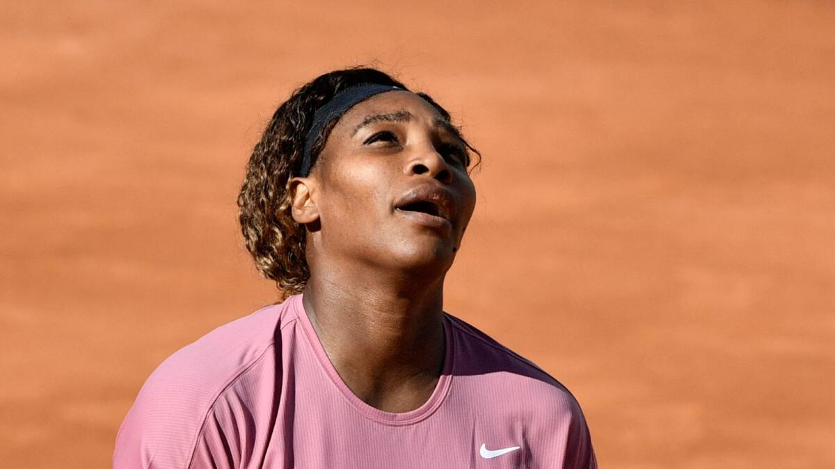 Serena Williams reacts after losing to Nadia Podoroska in Rome. (AFP)