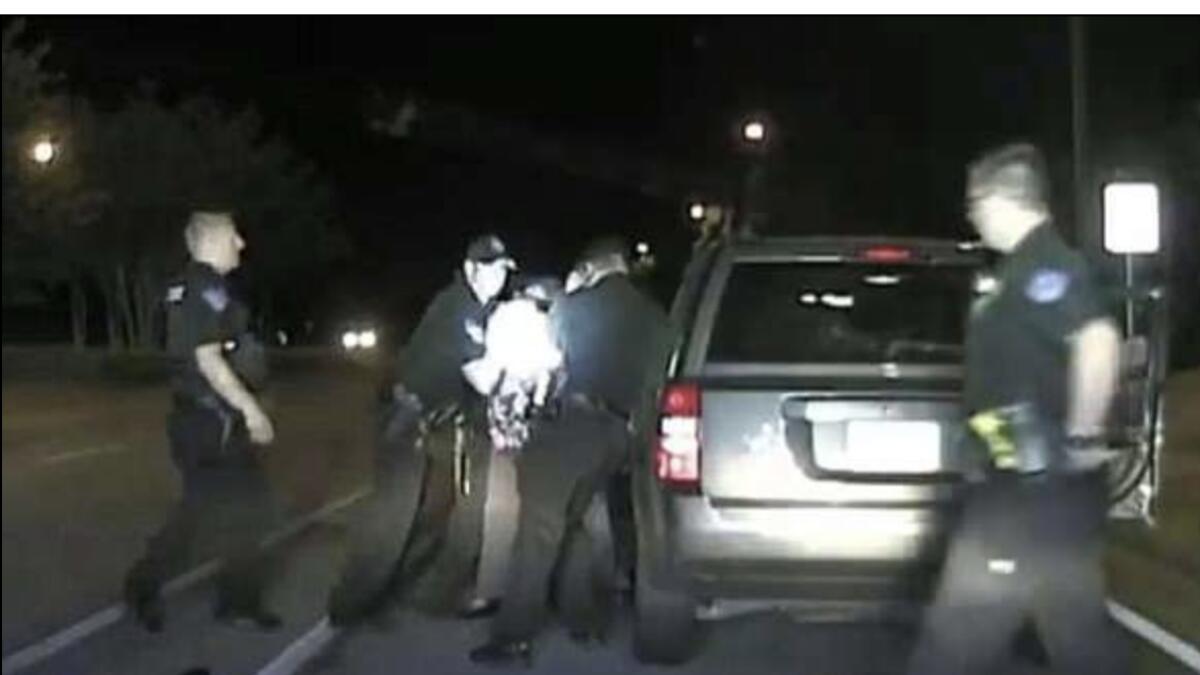 US cop abuses, drags out 65-year-old woman from car