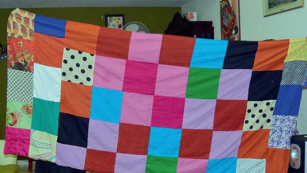 A bedsheet made from scraps of fabric, which are usually discarded by boutiques.