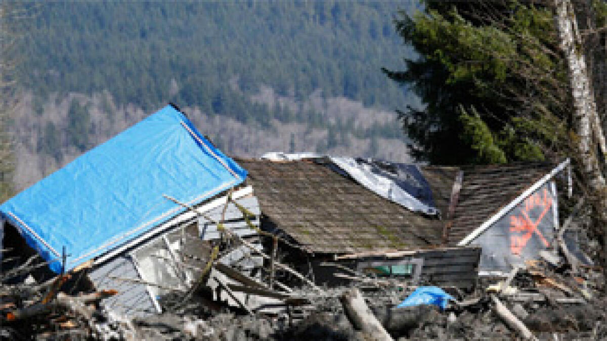 Eight dead in Washington state landslide, 18 missing