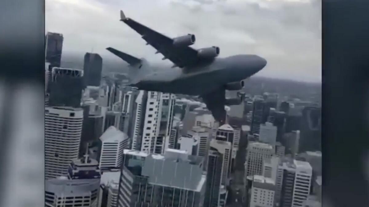 Video: Plane flies close to skyscrapers, office workers fear another 9/11