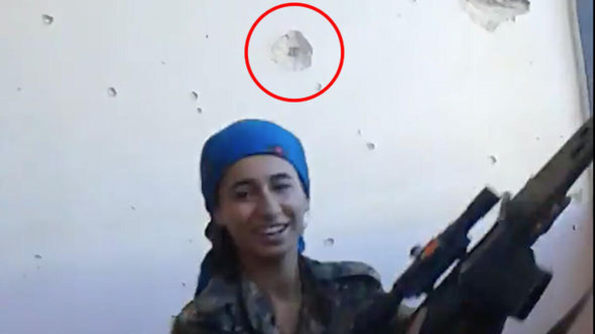 Video: Female sniper dodges Daesh bullet by inches