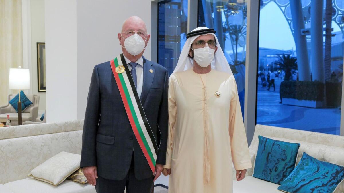 Sheikh Mohammed bin Rashid Al Maktoum with Klaus Schwab after presenting the Mohammed bin Rashid Medal to the WEF founder in Dubai. — Wam