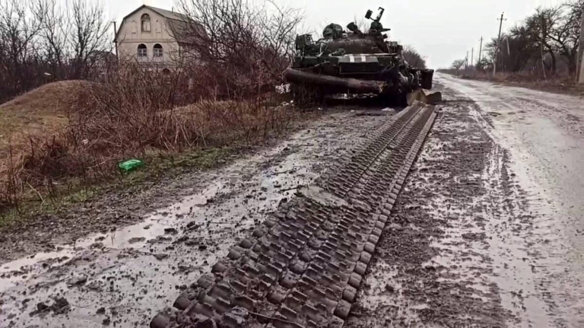 This screen grab obtained from a handout video released by the Russian Defence Ministry on March 4, 2022, shows a destroyed Ukrainian army tank in the settlement of Gnutovo outside Mariupol. Photo: AFP