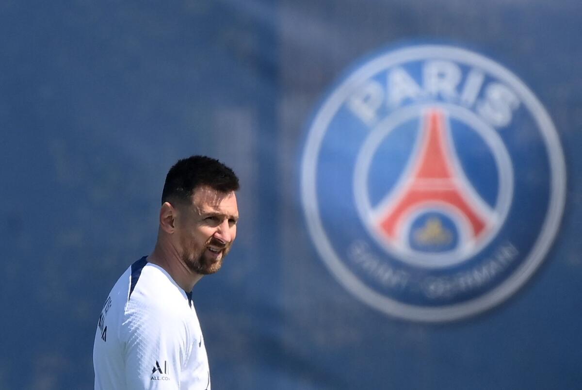 Paris Saint-Germain's Argentinian forward Lionel Messi reacts during a training session.   — AFP