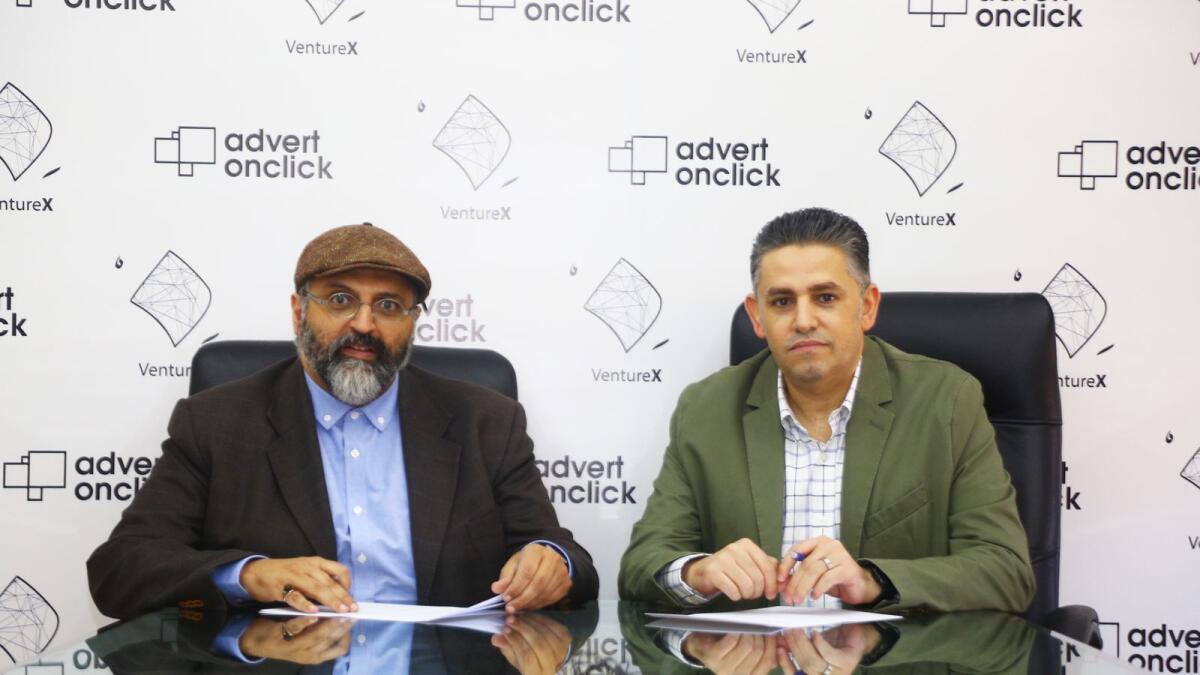 Yousef Hamidaddin, Managing Partner at VentureX, and Fahed Aldeeb, Founder and CEO of Advert on Click, sign MoU in the presence of a number of officials from both the companies.