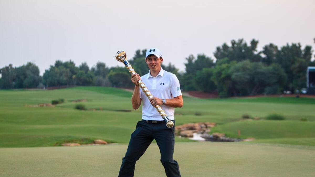 Matthew Fitzpatrick  with the DP World Tour Championship trophy that he won on Sunday at the Jumeirah Golf Estate in Dubai.