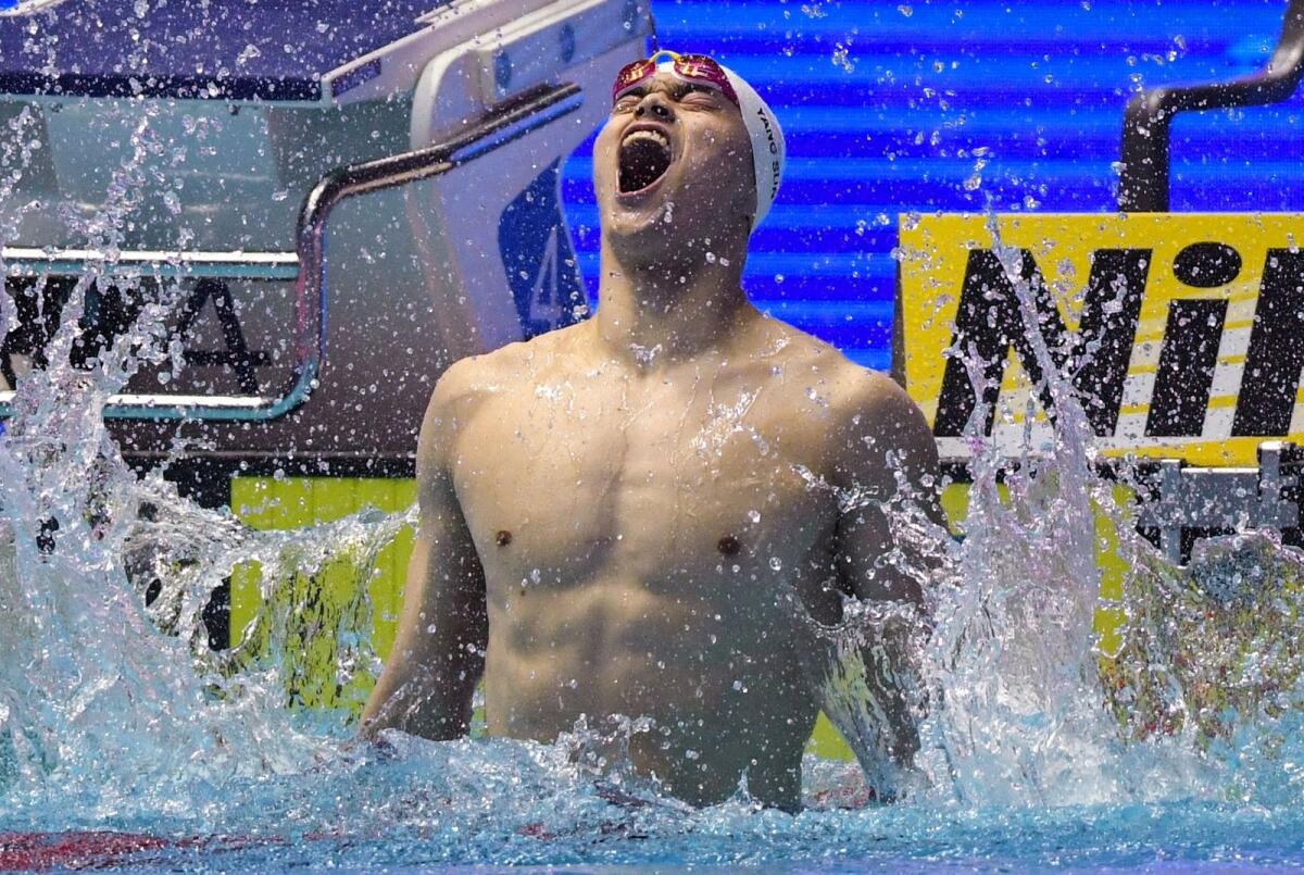 China's Sun Yang celebrates after winning the final of the men's 400m freestyle event at the 2019 World Championships. — AFP file