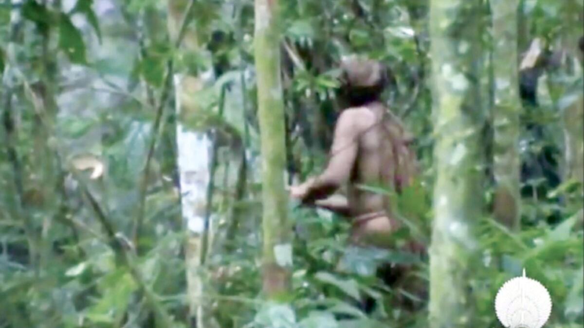 In this 2011 video frame released by Brazil's National Indian Foundation, the indigenous man, known as the man of the hole, is seen amid the forest, in Rondonia. — AP