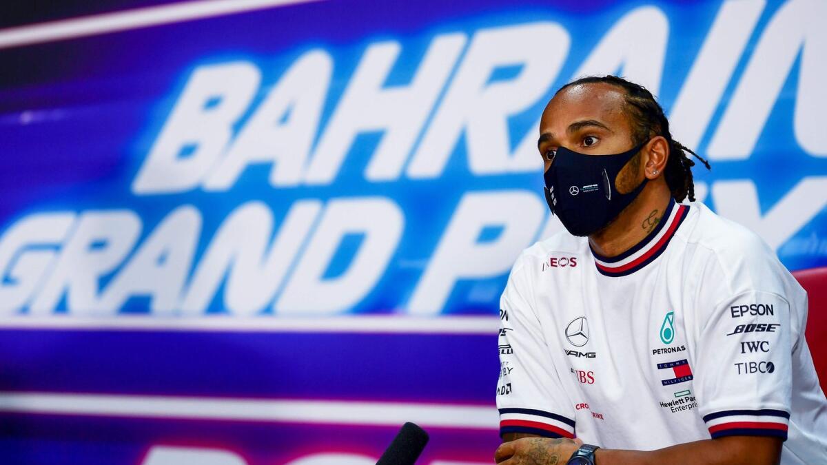 Mercedes' British driver Lewis Hamilton listens to a question during the presser ahead of the Bahrain Formula One Grand Prix at the Bahrain International Circuit in the city of Sakhir on November 26, 2020. AFP