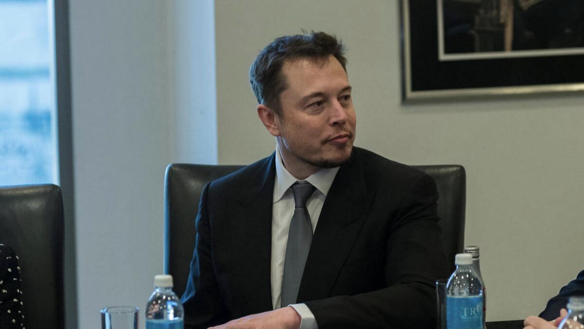  Musk to step down as Tesla chairman, agrees to pay $20m