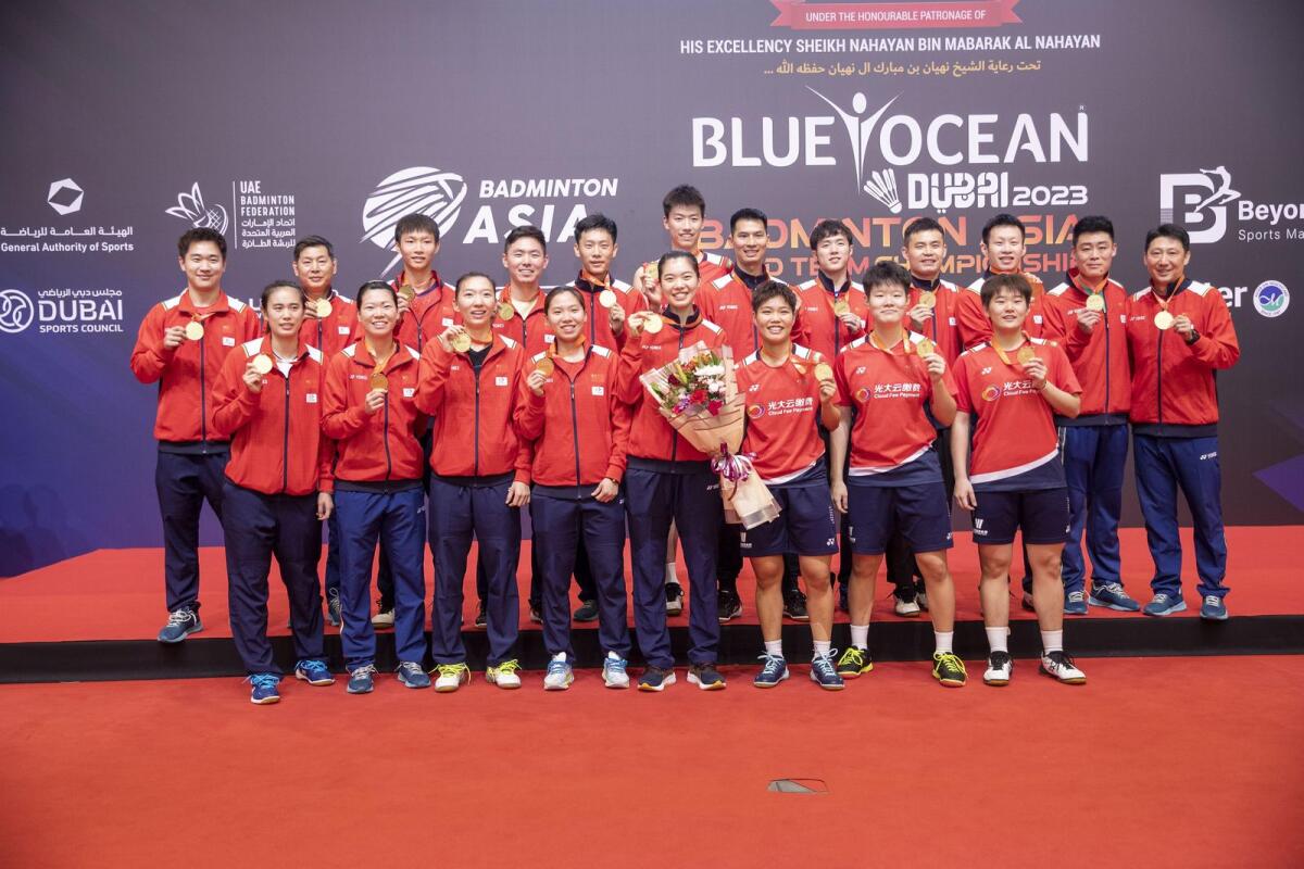 The Chinese team celebrate their victory on Sunday. — Supplied photo