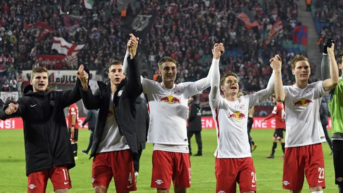 Promoted Leipzig brush off critics to go top of the table