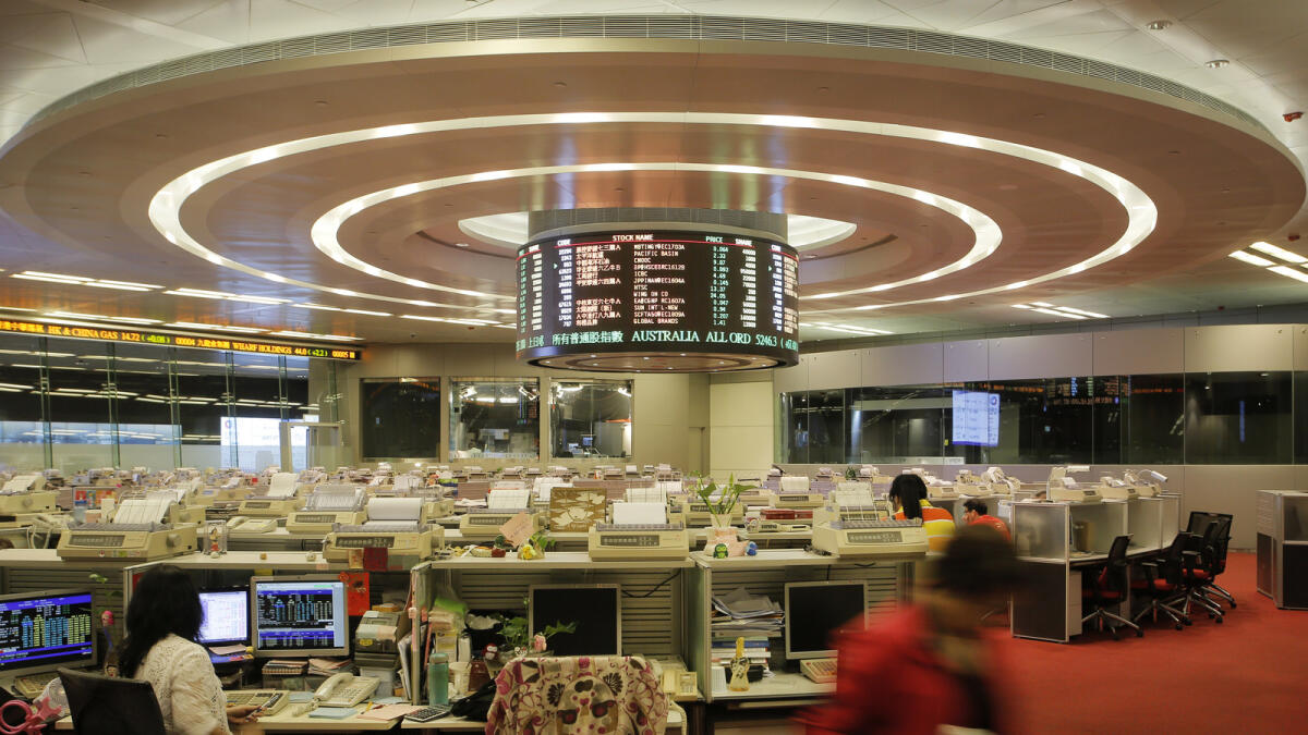 The Hong Kong Stock Exchange. Gains were broad, overshadowing a downbeat mood in global markets.  AP
