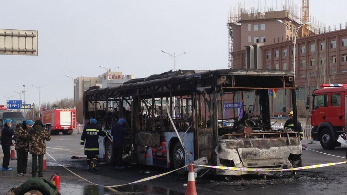 Bus catches fire in north China, 14 dead, over 30 injured