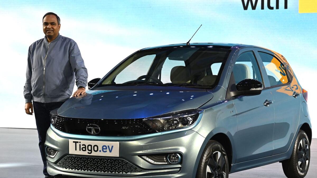 Managing director at Tata Motors Passenger Vehicles and Tata Passenger Electric Mobility Shailesh Chandra speaks during the launch of the new Tata 'Tiago EV' electric vehicle in Mumbai on September 28, 2022. — AFP
