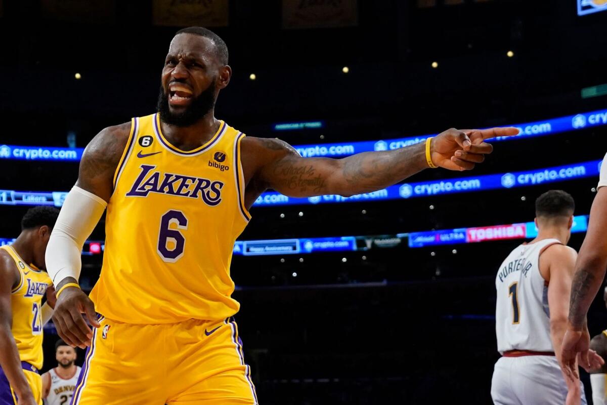 Los Angeles Lakers forward LeBron James (6) argues a call in the second half of Game 4 of the NBA basketball Western Conference Final series against the Denver Nuggets. — AP