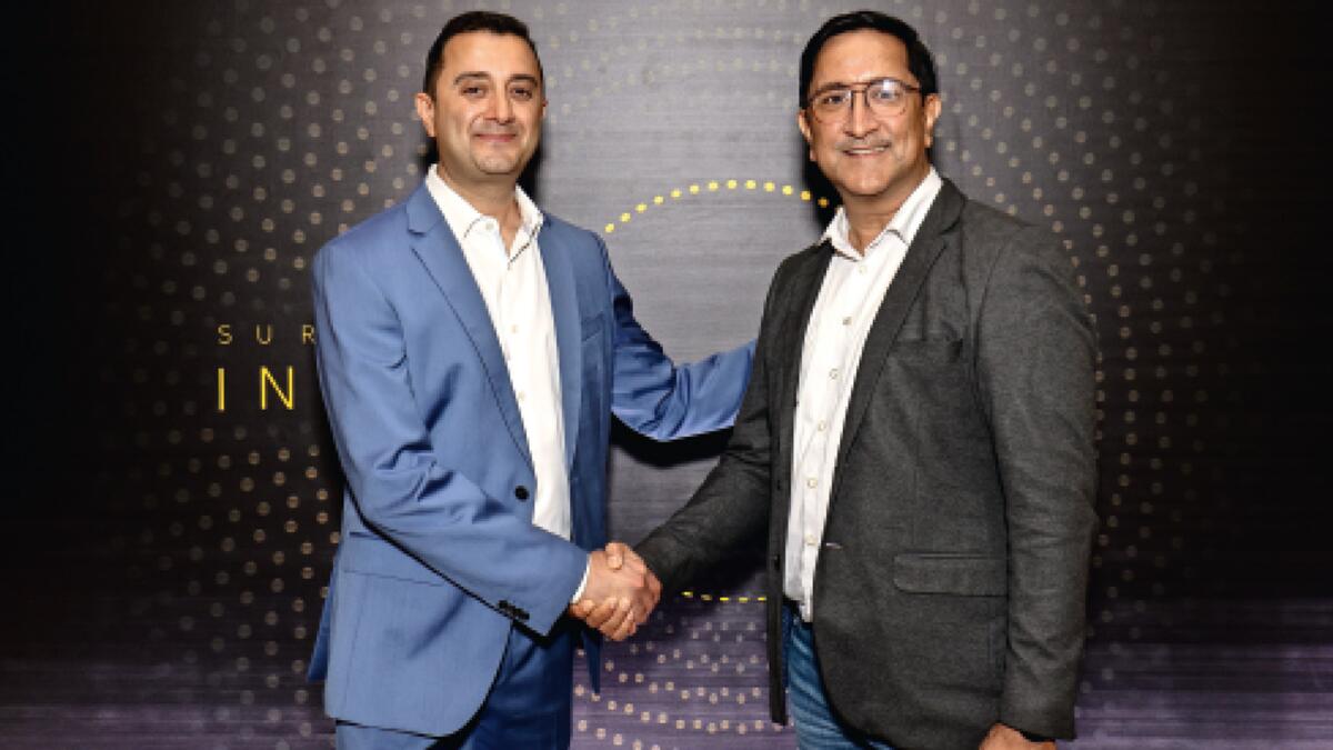 Zubin Chagpar,  business group leader, modern work and cybersecurity and devices, Microsoft with Jeetendra Berry, president, IT volume distribution, Redington MEA