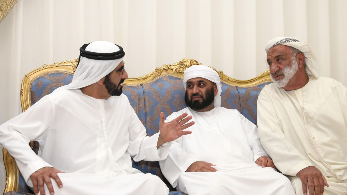 Shaikh Mohammed with family members of Juma Jawhar Juma Al Hammadi in Sharjah.