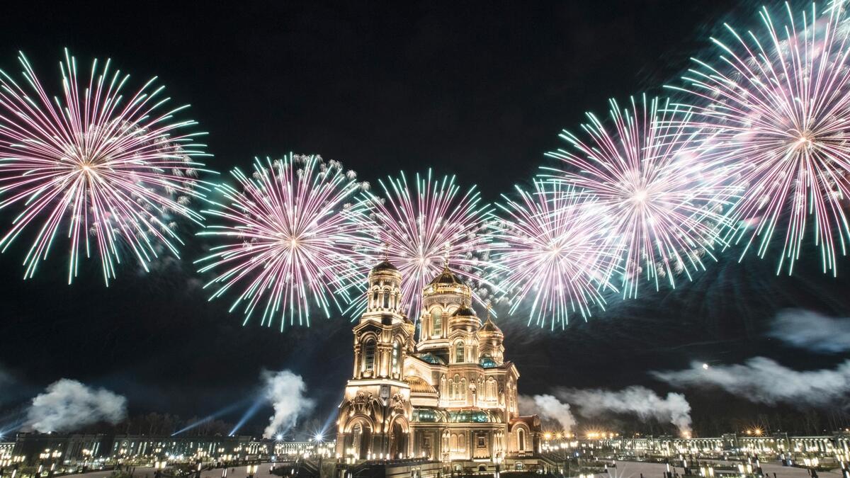 Fireworks explode over the Cathedral of Russian Armed Forces during the Spasskaya Tower military music festival in Kubinka, outside Moscow, Russia. Due to coronavirus, the annual international music festival in Red Square was canceled, an online festival without spectators took place Sunday on the Cathedral Square in Patriot Park, outside Moscow. Photo: AP