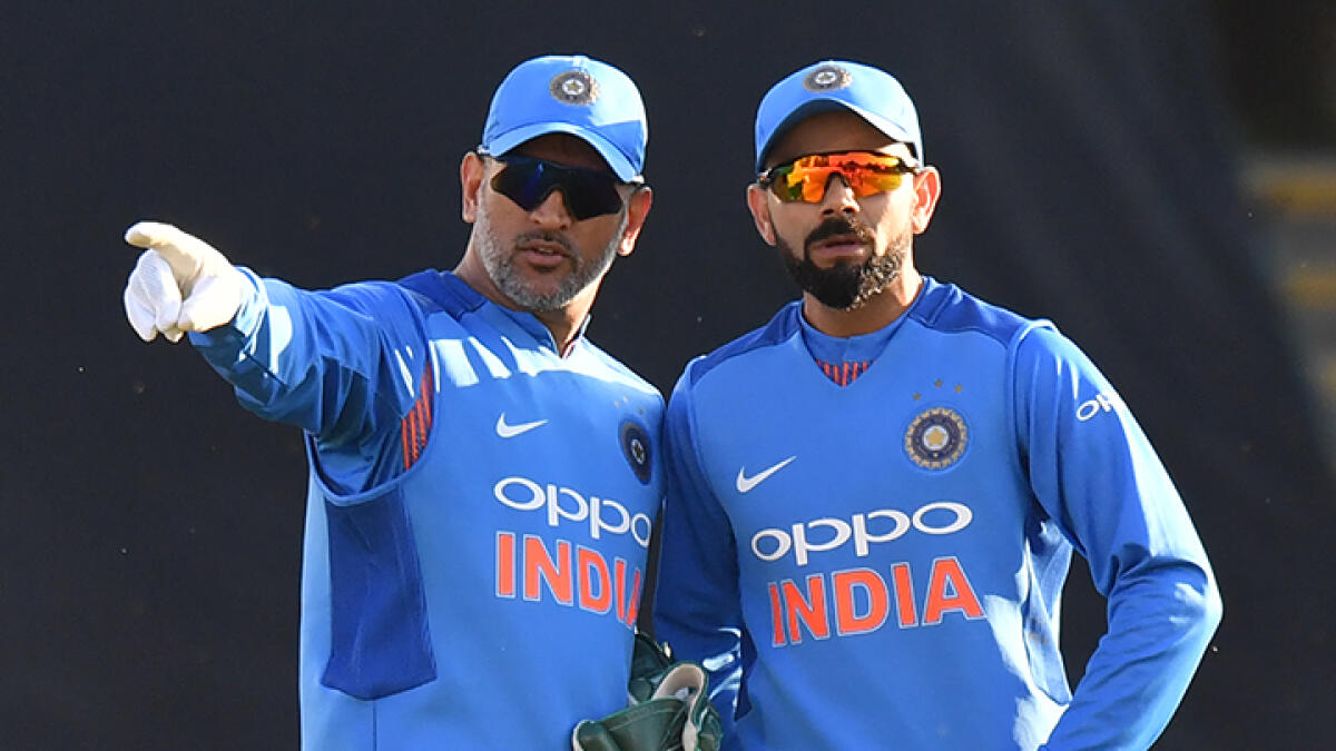 Virat Kohli and M.S. Dhoni formed a potent combination for Team India. -- AFP file