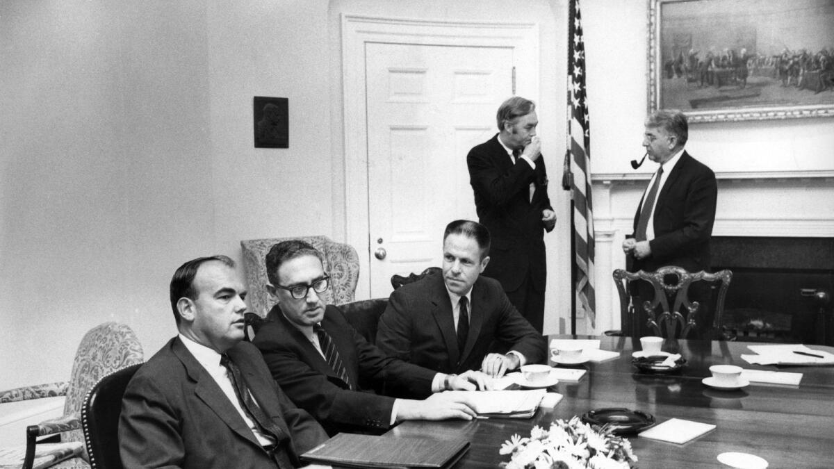 FILE — From left: John Ehrlichman, Henry Kissingner, H.R. Haldeman, Daniel Patrick Monynihan and Arthur Burns at a meeting for White House staff in Washington on June 27, 1969.  (George Tames/The New York Times)