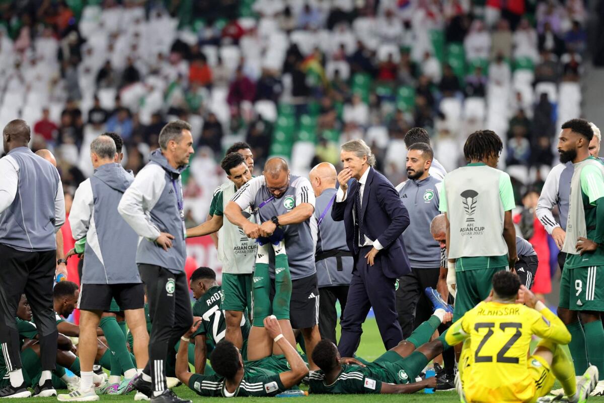 Saudi Arabia's Italian coach Roberto Mancini (centre) gestures before the start of the penalty shootout. — AFP