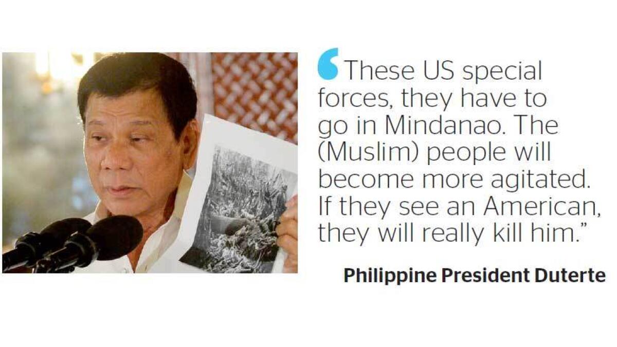 Philippine president wants US forces out of restive south