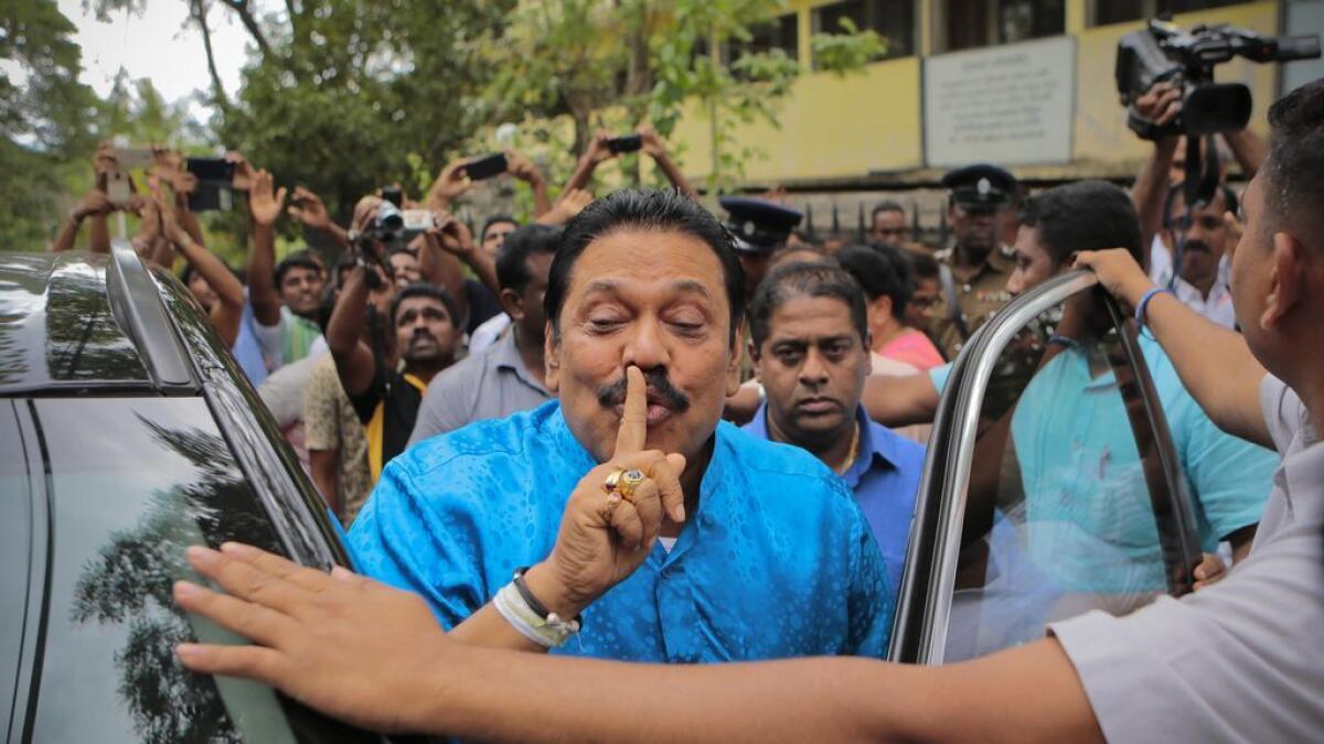 Parliamentary candidate Mahinda Rajapaksa gestures. 