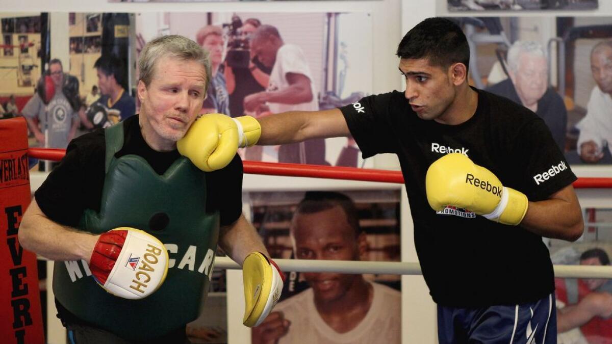 Khan wants to box for Pakistan at Olympics