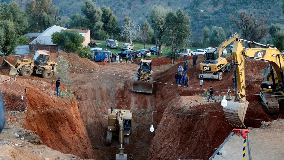 Moroccan authorities and firefighters work to get five-year-old child Rayan out of a well into which he fell after 36 hours earlier, on February 3, 2022 in the region of Chefchaouen near the city of Bab Berred. (Photo: AFP)