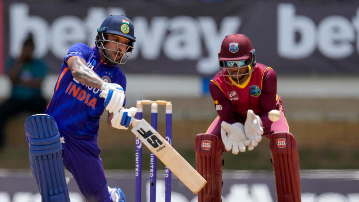 India's captain Shikhar Dhawan plays a shot during the first ODI against the West Indies on Friday. — AP