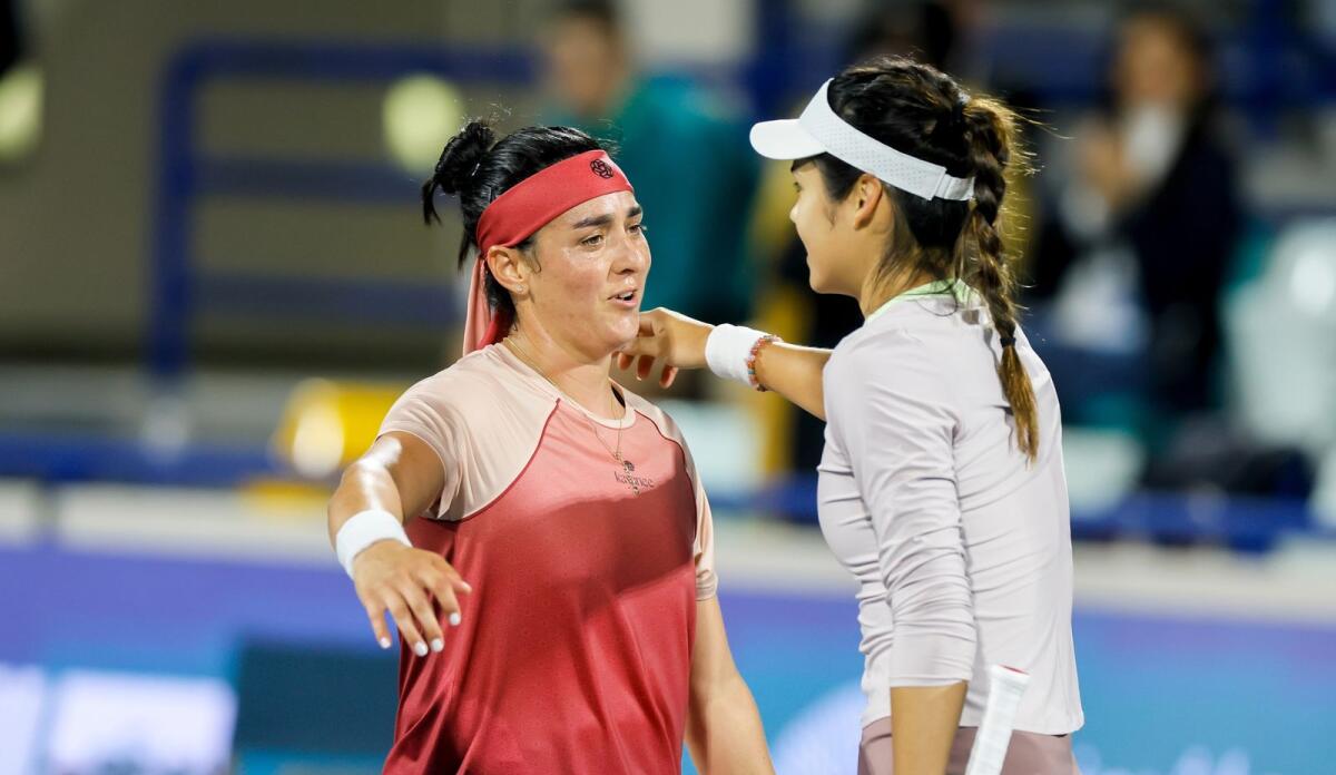 Emma Raducanu (right) congratulates Ons Jabeur after their match. — Supplied photo