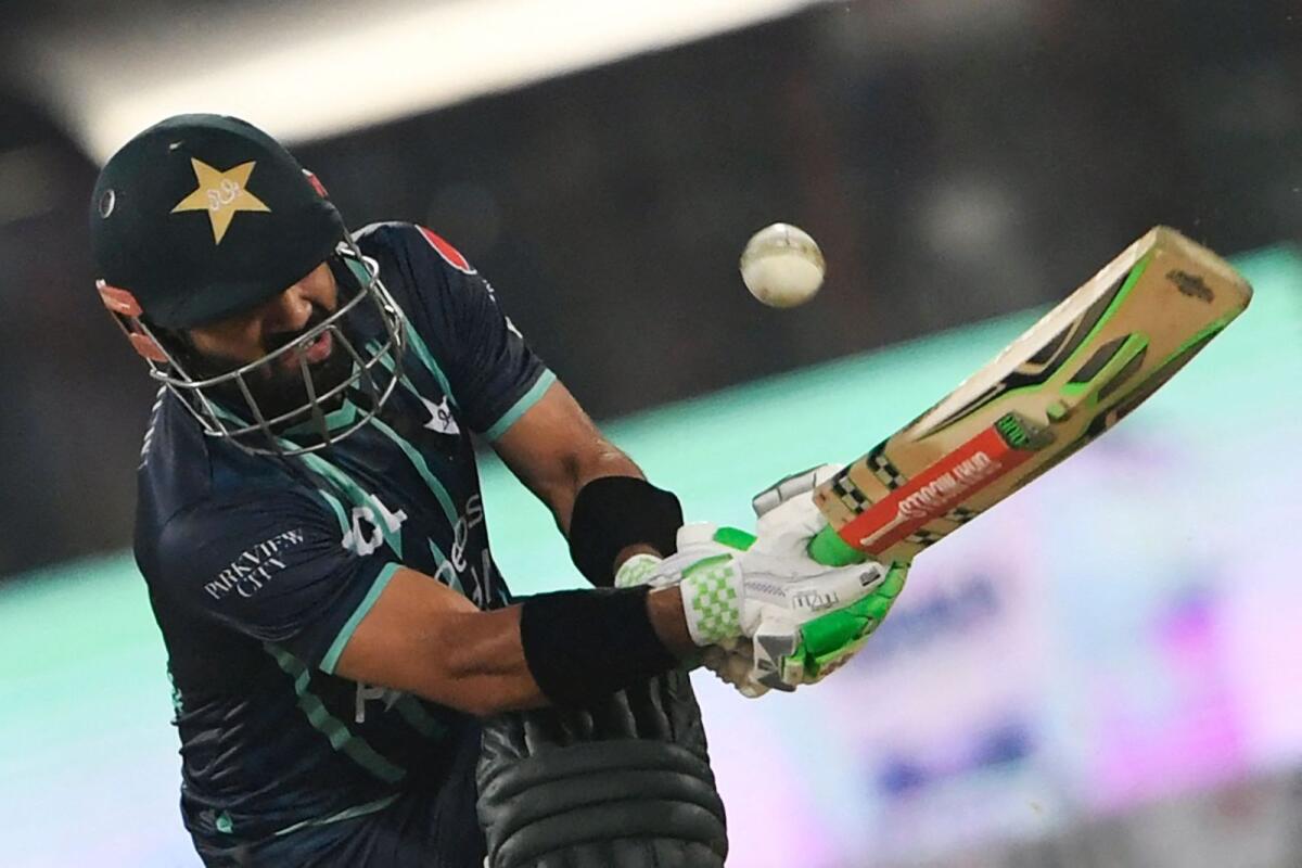 Pakistan's wicketkeeper Mohammad Rizwan plays a shot during the fifth T20 match against England. (AFP)