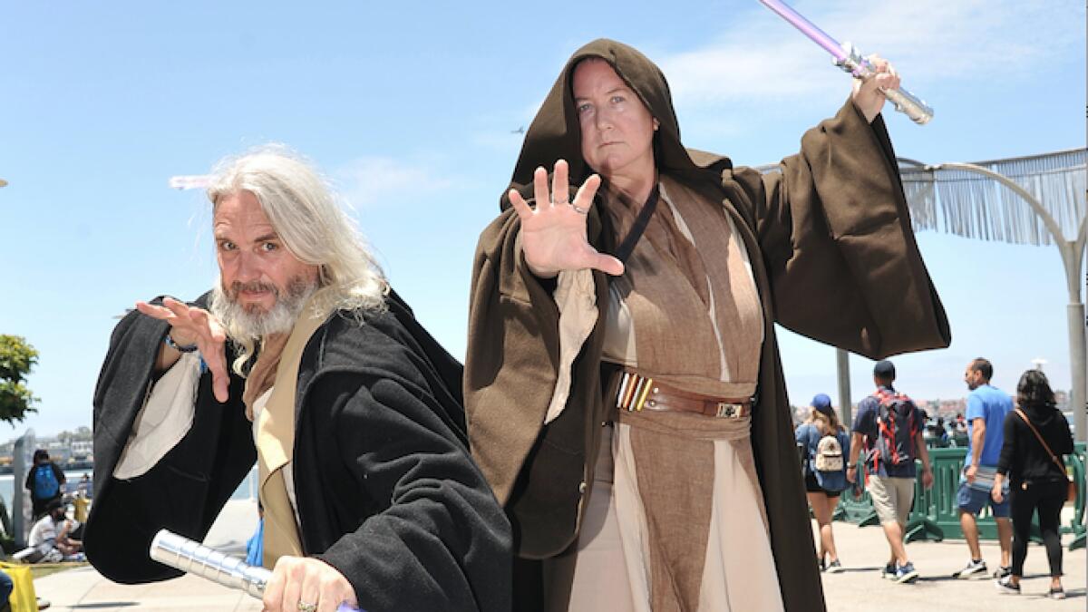 Paul Primose, left, and Joyce Primose, of San Diego, dressed as characters from 'Star Wars'