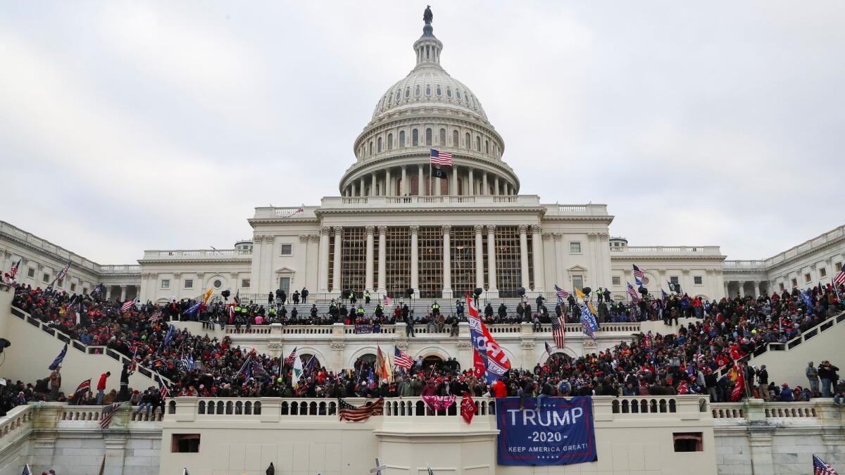 Supporters Trump gather in front of the US Capitol Building in Washington on January 6, 2021. Reuters